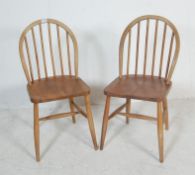 TWO 1950’S ERCOL BEECH AND ELM DINING CHAIRS MODEL CC290