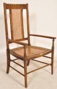 1920’S OAK AND CANE BEDROOM CHAIR