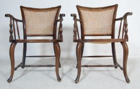 TWO 1920’S MAHOGANY AND CANE SALOON CHAIRS