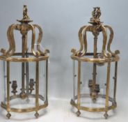 PAIR OF VICTORIAN BRASS AND GLASS PORCH LANTERNS