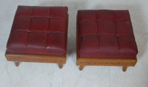 TWO ANTIQUE STYLE HAND CARVED FOOTSTOOLS