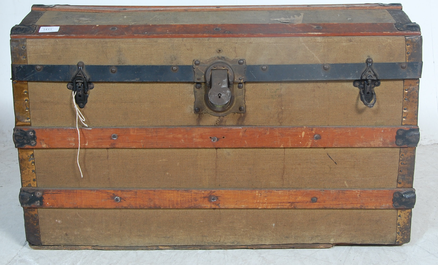 1930’S WOOD, METAL AND CANVAS SHIPPING TRUNK