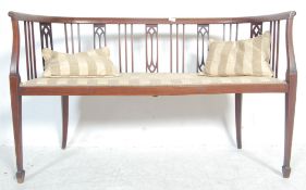 EDWARDIAN MAHOGANY AND MARQUETRY INLAID SOFA SETTEE.