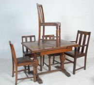 1940’S OAK DRAW LEAF DINING TABLE AND FOUR DINING CHAIRS