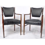 MATCHING PAIR OF TEAK AND LEATHER UPHOLSTERED ARMCHAIRS
