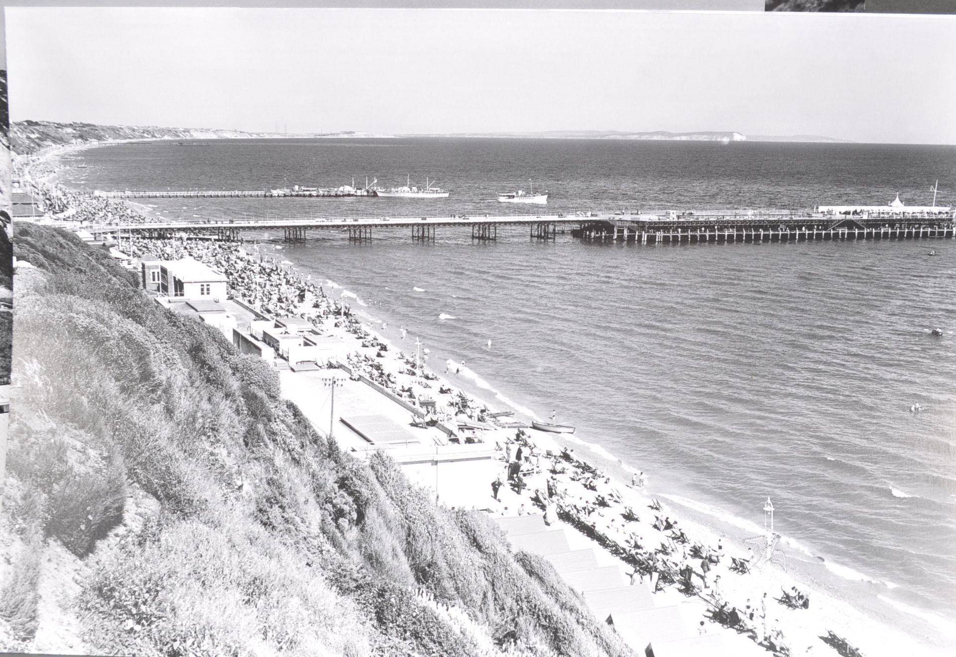 TWELVE BLACK AND WHITE PRINTEDPOSTCARD PHOTOGRAPHS OF SEASIDE TOWNS. - Image 7 of 7