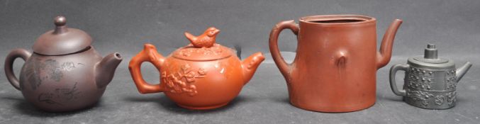 FOUR CHINESE ORIENTAL TERRACOTTA TEAPOTS