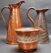 PAIR OF ARTS AND CRAFTS COPPER JUGS BY JOSEPH SANKEY AND SONS