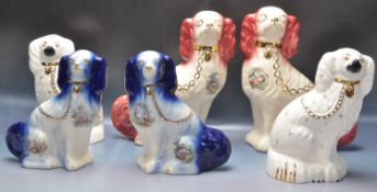 GROUP OF THREE 20TH CENTURY STAFFORDSHIRE DOGS TO INCLUDE A ROYAL DOULTON PAIR.