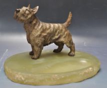 EARLY 20TH CENTURY ONYX AND SPELTER DOG ASH / PIN TRAY