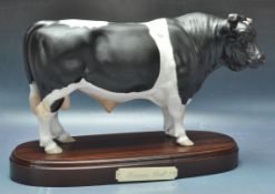 ROYAL DOULTON FRIESIAN BULL FIGURINE.