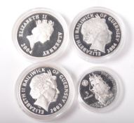 COLLECTION OF FOUR MARITIME RELATED SILVER COINS
