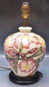 20TH CENTURY MOORCROFT MAGNOLIA TABLE LAMP.