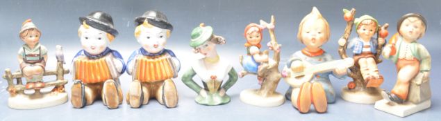 GROUP OF EIGHT 20TH CENTURY W. GOEBEL CERAMIC FIGURINES