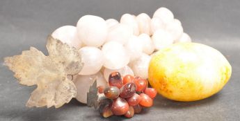 TWO BUNCHES OF CRYSTAL QUARTZ GRAPES AND A YELLOW CRYSTAL EGG.