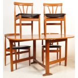 FOUR TEAK WOOD FRAME DANISH INSPIRED DINING CHAIRS AND A DROP LEAF DINING TABLE