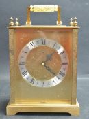 LARGE JUGHANS QUARTZ BRASS CASED CARRIAGE CLOCK.