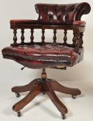 20TH CENTURY REPRODUCTION OX BLOOD CAPTAINS CHAIR