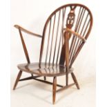 20TH CENTURY ERCOL ARMCHAIR IN FLEUR DE LYS PATTERN