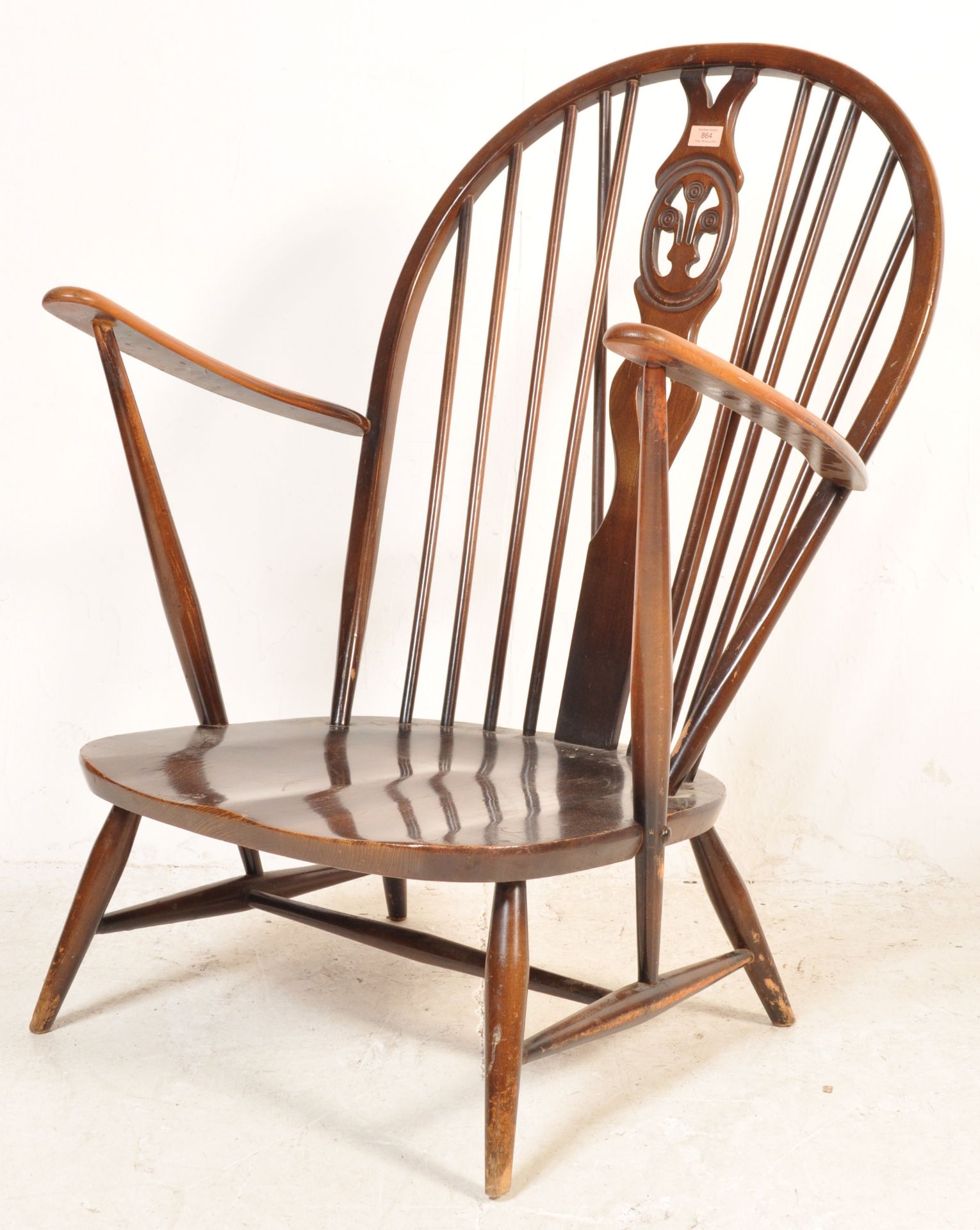 20TH CENTURY ERCOL ARMCHAIR IN FLEUR DE LYS PATTERN