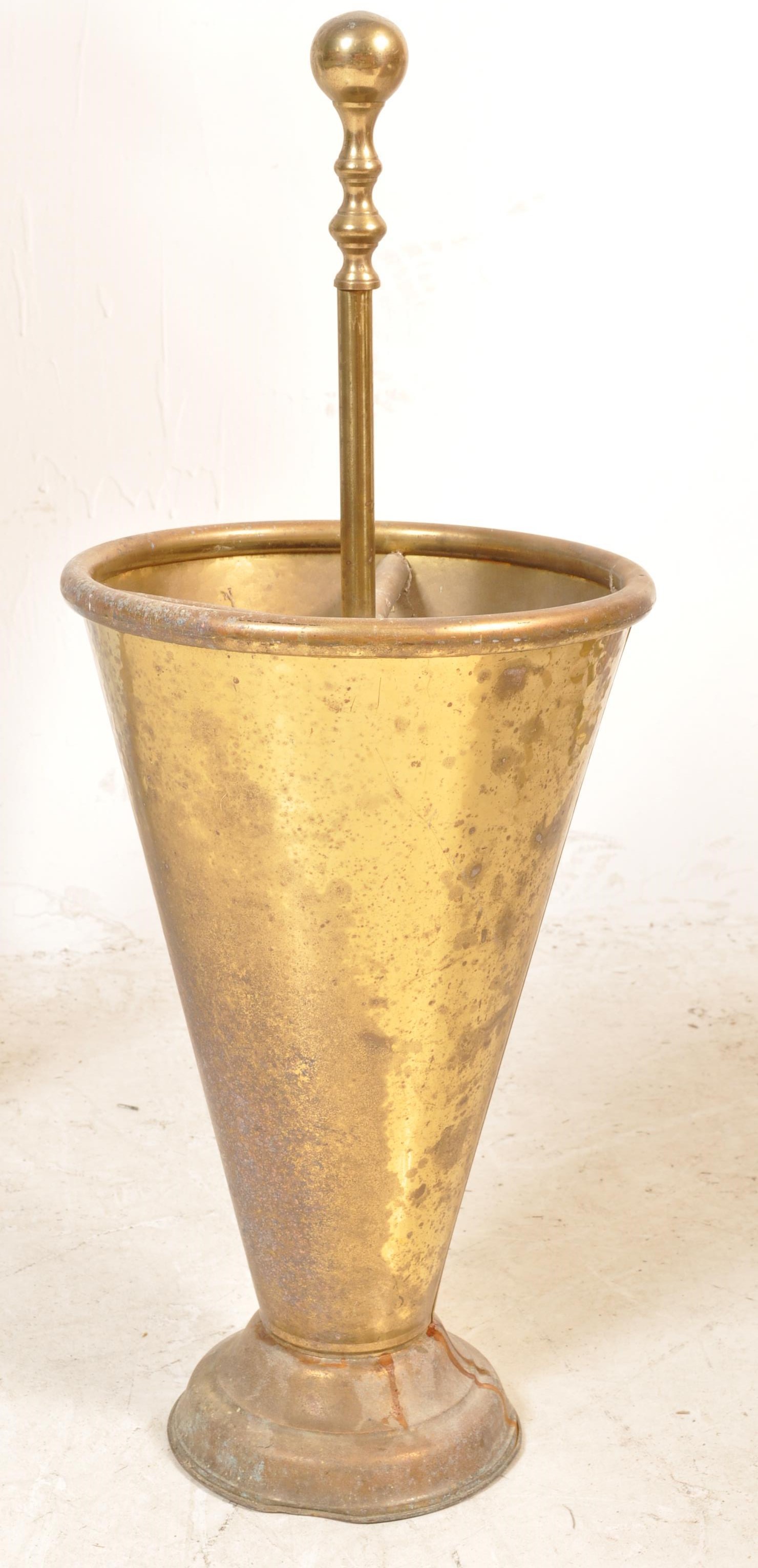 EARLY 20TH CENTURY BRASS STICK STAND OF TAPERING FORM