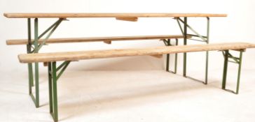 20TH CENTURY FOLDING TRESTLE BEER HALL TABLE AND BENCHES.