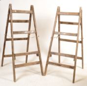 TWO LARGE VINTAGE A-FRAME WOODEN LADDERS BY A BRATT SND SONS LTD NOTTINGHAM