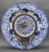 19TH CENTURY EUGENE FARCOT CLOCK MOUNTED ON A BLUE AND WHITE CREIL MONTEREAU PLATE