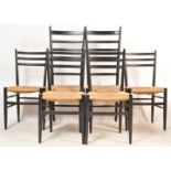 SET OF FOUR RUSH SEATS AND BLACK FRAME DINING CHAIRS
