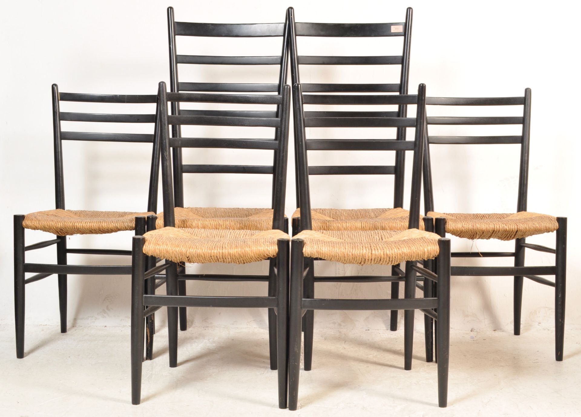 SET OF FOUR RUSH SEATS AND BLACK FRAME DINING CHAIRS