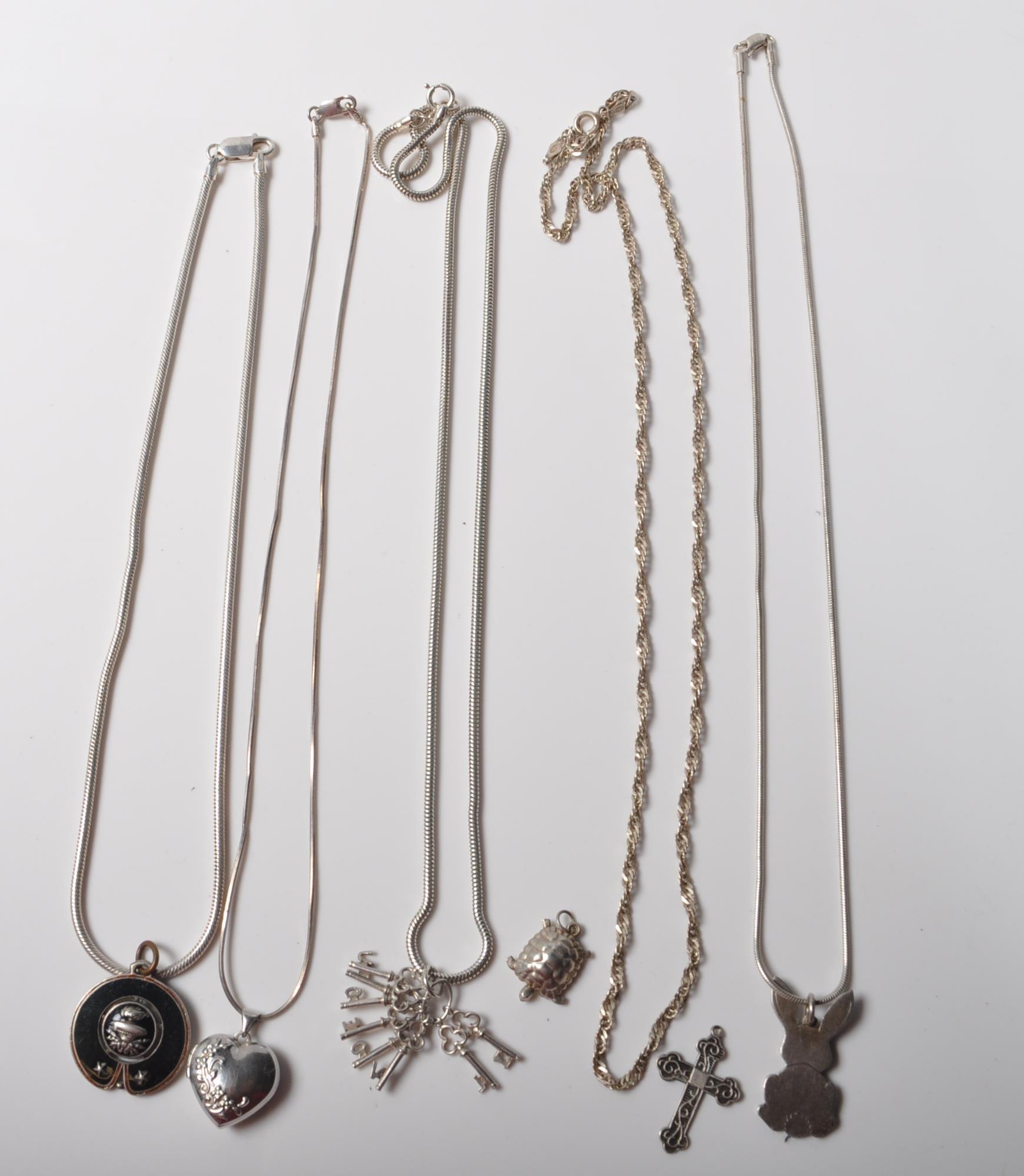 A COLLECTION OF LADIES STAMPED 925 SILVER PENDANTS AND CHAIN NECKLACES.