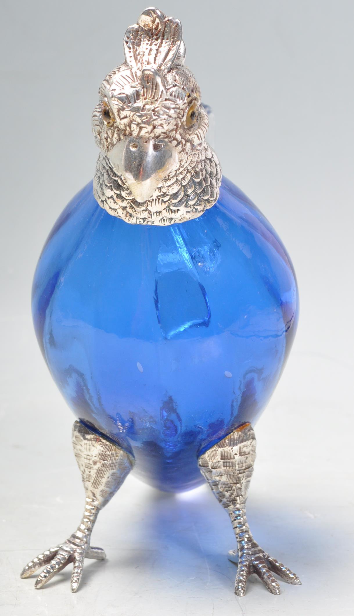 SILVER PLATE AND BLUE GLASS PARROT CLARET JUG. - Image 4 of 7