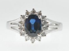 18CT WHITE GOLD AND SAPPHIRE RING