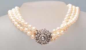 DIAMOND AND PEARL THREE STRAND NECKLACE