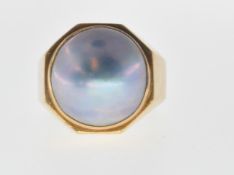 18CT GOLD AND BLUE PEARL RING