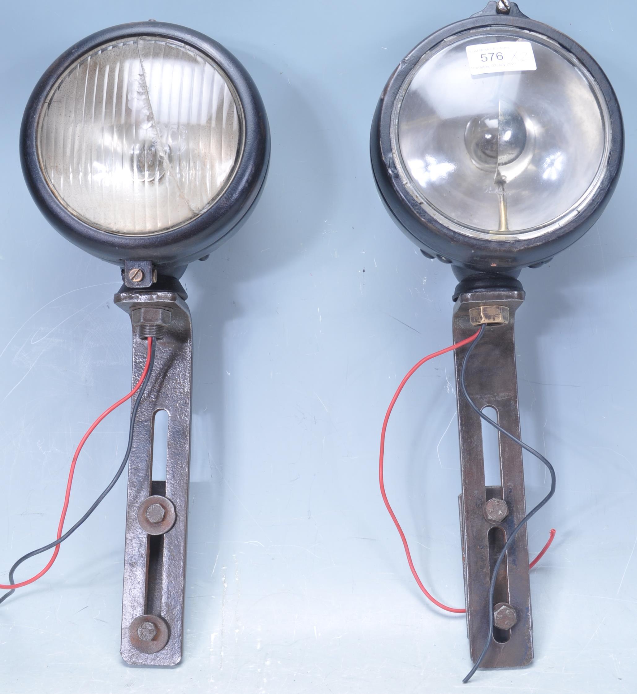 TWO VINTAGE RETRO 20TH CENTURY AUTOMOBILES HEADLIGHTS