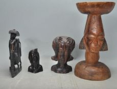 GROUP OF CARVED WOODEN FIGURINES