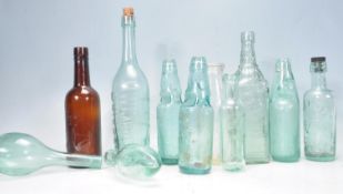 COLLECTION OF ANTIQUE 19TH CENTURY GLASS BOTTLES.