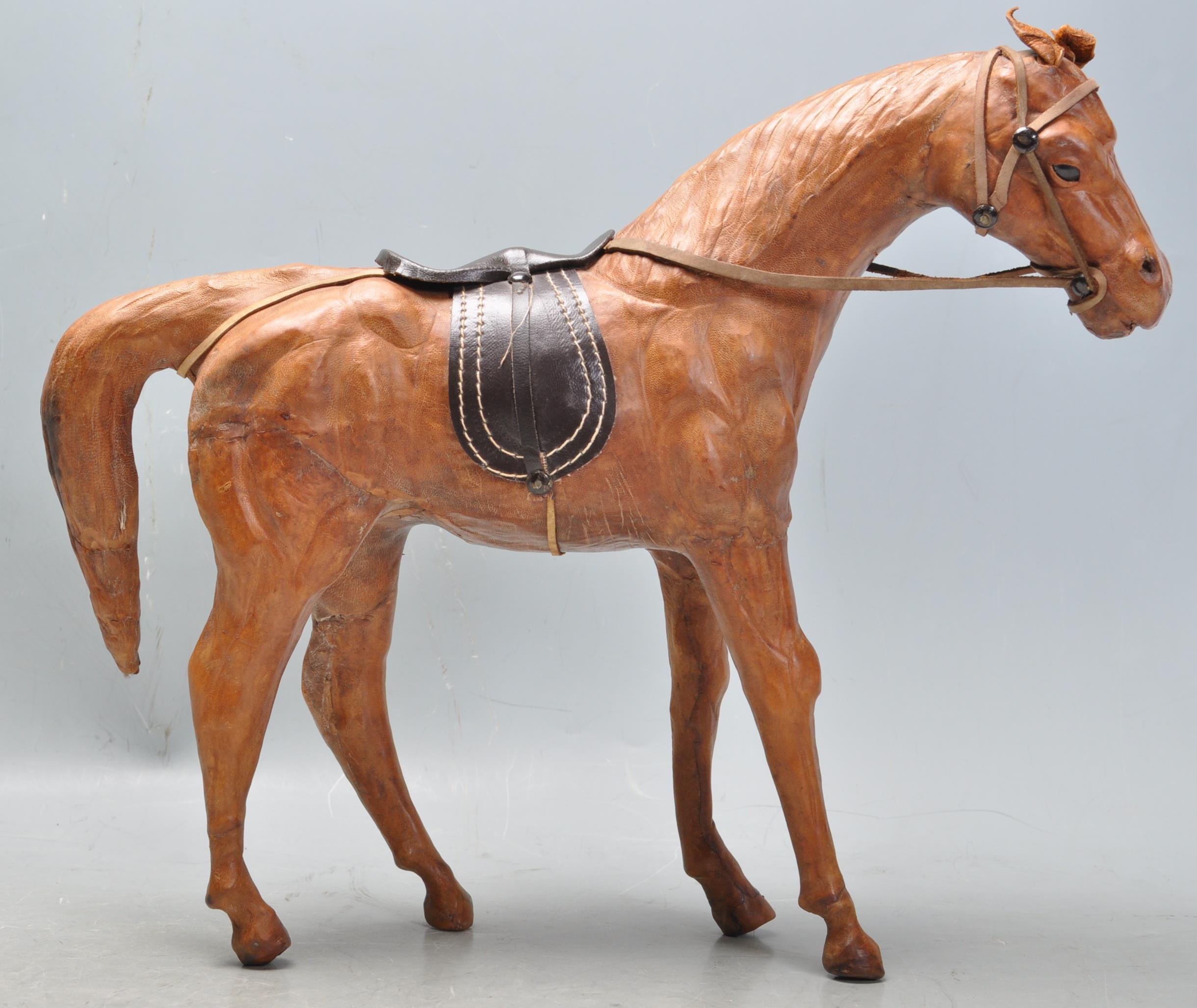 ANTIQUE STYLE LEATHER HORSE FIGURE IN THE LIBERTY MANNER