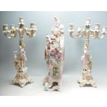 19TH CENTURY FRENCH REPRODUCTION THREE PIECE CLOCK AND CANDLESTICK SET.