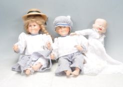 THREE PORCELAIN FACE DOLLS