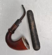 20TH CENTURY SILVER COLLARED PIPE AND BAKELITE CHEROOT HOLDER.