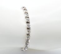 14CT GOLD AND DIAMOND LINE BRACELET