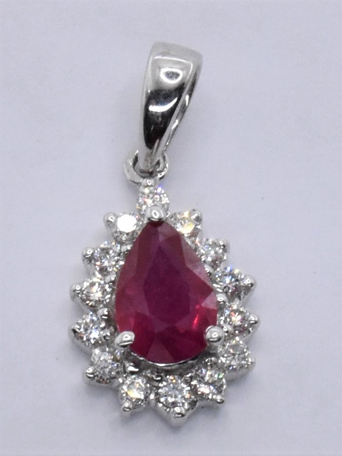 18CT WHITE GOLD RUBY AND DIAMOND PENDANT