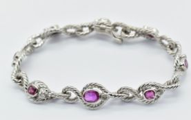 FRENCH 18CT WHITE GOLD RUBY AND DIAMOND BRACELET