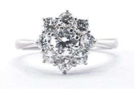 18CT WHITE GOLD AND DIAMOND CLUSTER RING