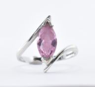 9CT WHITE GOLD AND PINK STONE CROSSOVER RING