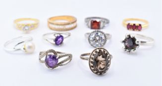 TEN SILVER STONE SET RINGS