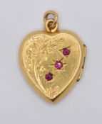 19TH CENTURY VICTORIAN GOLD AND RUBY SET LOCKET