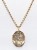 LARGE 9CT GOLD LOCKET AND LONG CHAIN